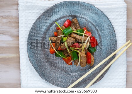 Beef stir fry with peppers and oyster sauce - top view