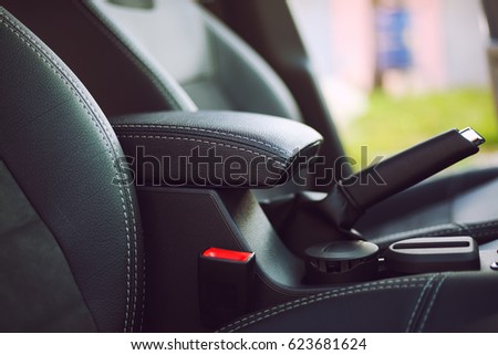 armrest in the luxury passenger car, detail in the interior Royalty-Free Stock Photo #623681624
