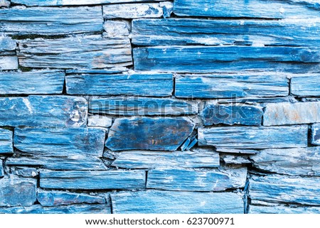 Blue stone wall, background, texture. Toned