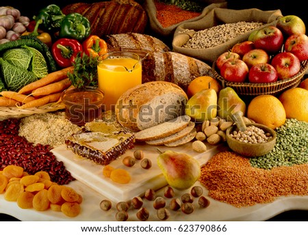 TABLETOP SELECTION OF WHOLEFOODS/HEATHFOODS Royalty-Free Stock Photo #623790866
