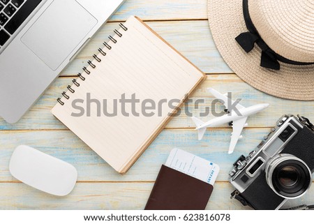 Summer holiday background, Travel and vacation items on wooden table. Top view