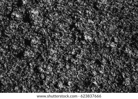 Abstract grey texture. Stone and rock background. Natural texture. Black and grey abstract texture and background for designers. Natural stone pattern. Macro and closeup view of grey stone. 