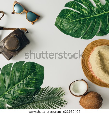 Creative  tropical summer travel layout. Flat lay.  Vacation concept. Royalty-Free Stock Photo #623932409