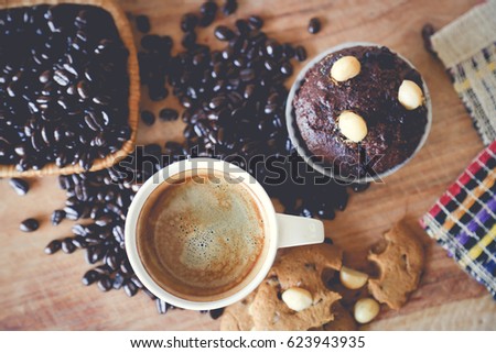 Muffin chocolate and hot coffee