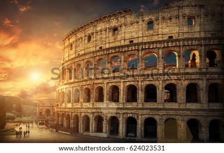 Rome, Italy.One of the most popular travel  place in world - Roman Coliseum under evening sun light and sunrise sky.