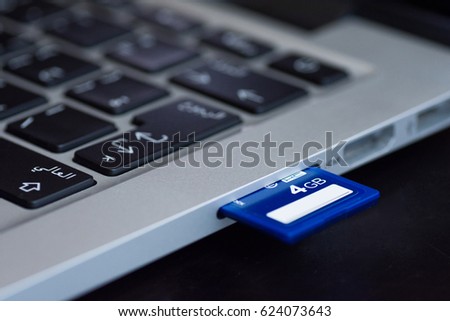 Close up to memory card in laptop import
