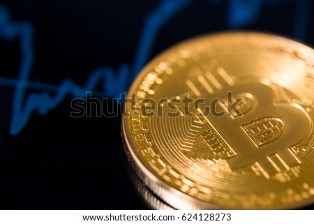 shiny bitcoin with chart