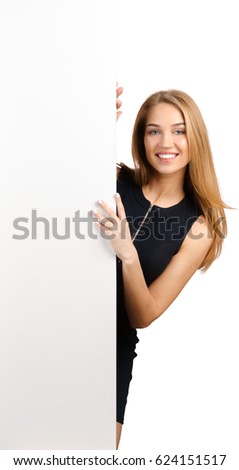 Woman smiling showing white blank sign billboard