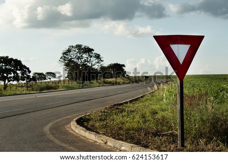 A sign on a road next to Goania, the capital of Goias State. Central area of Brazil.
