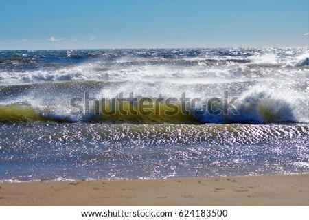 Waves crashing on the shores of Lake Huron at the Oscoda Beach Park Pier