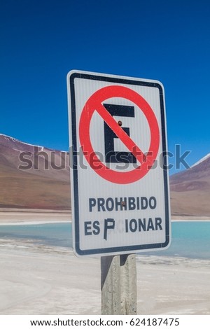 Sign near Laguna Verde in Bolivia. No parking was changed to Do no spy