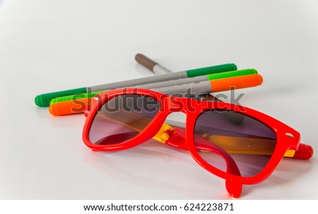 Marker pens, red, green, orange and brown, set color  highlighters, sunglasses, school tools