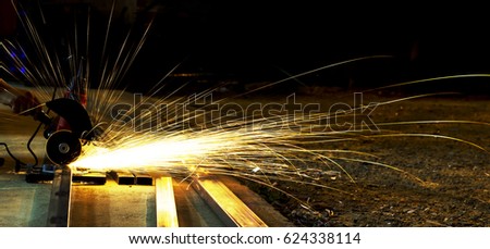 Cutting of a steel with splashes of sparks