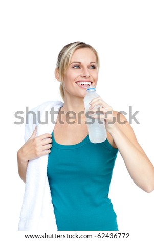 Smiling young woman with water and towel