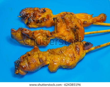 roasting chicken on blue dish