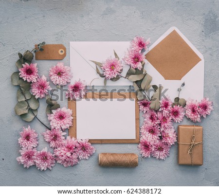 Workspace with card and envelope. Wedding invitation. Mock up. Flat lay 