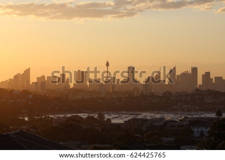 Magical sunset over the skyline of Sydney as seen on a summer evening from Dover Heights (Sydney, Australia)