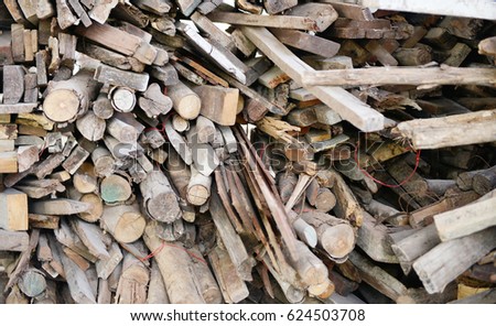 Stacked Wood Logs in construction sites, a pile of wooden logs