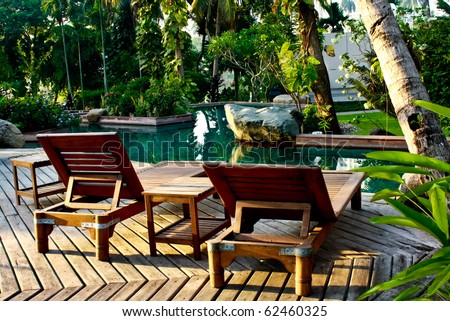 two chair near pool