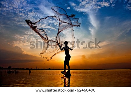 throwing fishing net during sunset , thai Royalty-Free Stock Photo #62460490