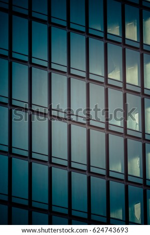 Business building with glass of windows background