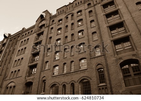 Speicherstadt (City of Warehouses - warehouse district). Built from 1883 to 1927. HafenCity quarter. Port of Hamburg. Northern Europe. Old style photo in Black and White color