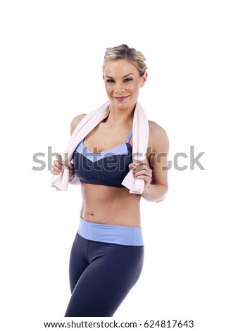 Young blonde woman in workout outfit while isolated on white