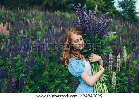 Girl with lupines