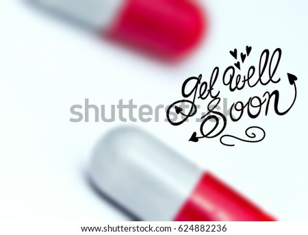 concept images of blur capsules and word-get well soon with isolated white background