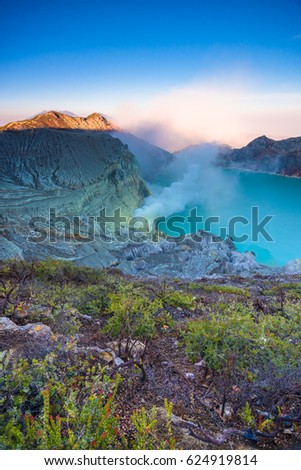 Kawa Ijen Volcano and lake in sunrise View at Indonesia