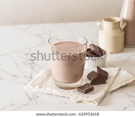 glass of chocolate milk on table