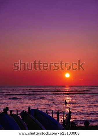 Sunset at Waikiki Beach, Honolulu, Oahu Island, Hawaii. Waikiki Beach in the center of Honolulu has the largest number of visitors in Hawaii.