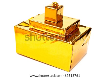 Four golden presents boxes isolated on white background