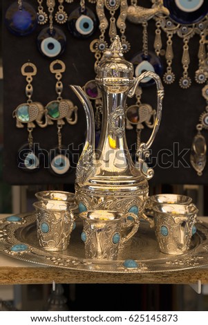 Traditional turkish tea set with beautiful details in souvenirs store. Vintage style.