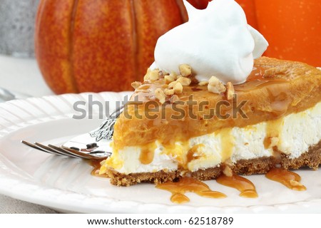Slice of Double Layer No Bake Pumpkin Pie made with pumpkin, vanilla pudding,cream cheese, and whipped cream.