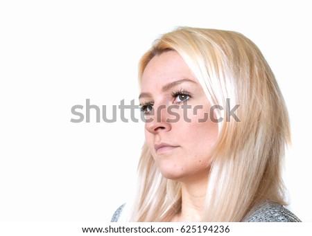Young blond girl thoughtful, on a white background
