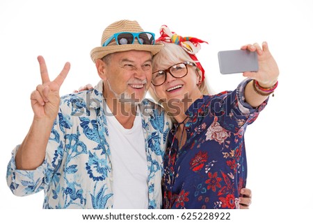 Smiling senior couple make a selfie