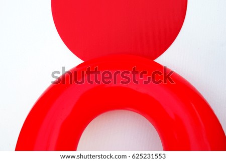 Two red circles overlap on white background.