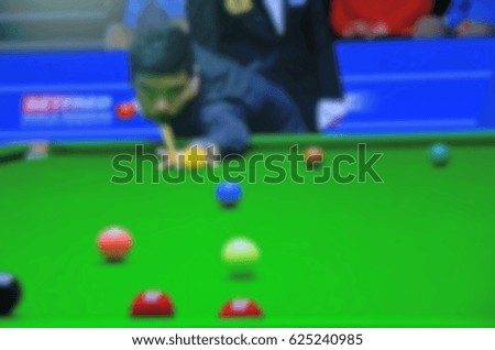 Blur picture of man and snooker game