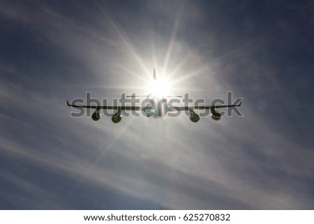 The plane flies in the sun. The plane in the sky. Aviation. Passenger airliner. air space. Air transportation.