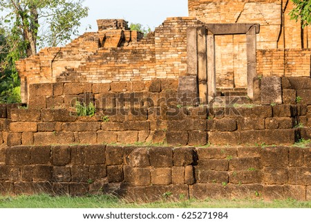 Ruins of old red brick castle of Khmer people in Thailand.