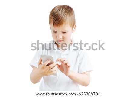 Little boy listen music and talk on phone with white background