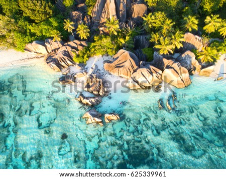 sunset at beautiful Anse Source D`argent beach at seychelles, Aerial drone photo