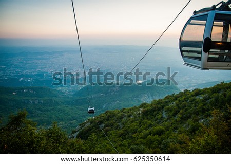 2016 Albania Tirana view from Dali moutain to the city. Line trolleyin an evening sun Royalty-Free Stock Photo #625350614