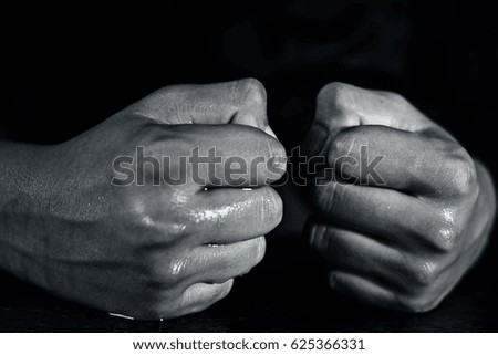 power packed hands with dark black background