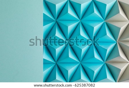 Abstract blue to grey paper poly  made from  tetrahedron background. Usefull for business cards and web.
