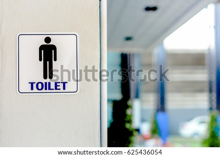 Bathroom sign, bathroom icon for gentlemen on cement floor