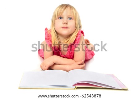 happy little girl reading a book