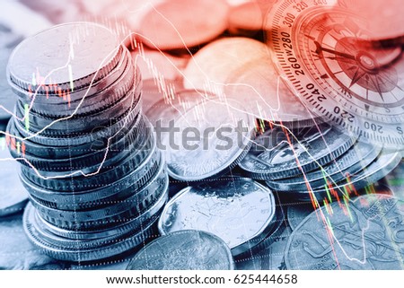 Pile and a stack of coins with technical chart of financial instruments. A concept about currency trading or investing which investors must analyse and make the right decision for optimal profits.