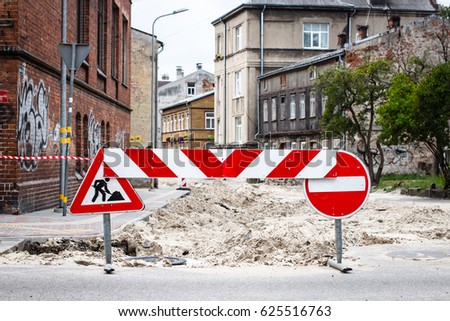 street reconstruction, red and white forbidden passing sign 